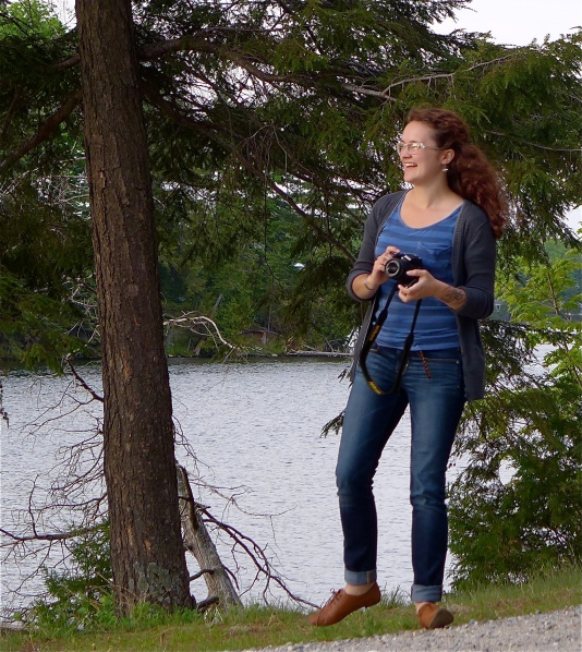 Sarah Parkinson beside a woodland lake somewhere in northern Ontario.